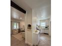 Stylish living space open to the kitchen, featuring modern finishes and ample natural light at 1455 Hudson St, Denver, CO 80220