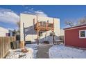 Backyard with detached studio, shed, and patio area at 3830 N Adams St, Denver, CO 80205