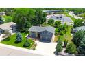 Charming two-story home with landscaped yard and two-car garage and nearby parking at 7270 S Cherry Dr, Centennial, CO 80122