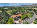 Beautiful mountain views and green spaces surround this stunning home in a quiet neighborhood at 14890 W 58Th Pl, Golden, CO 80403