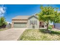 Charming single Gathering home with brick accents, attached garage, and lush lawn at 19771 E Wesley Pl, Aurora, CO 80013
