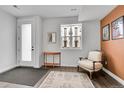 Inviting living room area with hardwood floors, natural light, and cozy decor at 3458 W 63Rd Ave, Denver, CO 80221