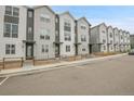 Street view of attractive townhomes with modern design and well-maintained exteriors at 3458 W 63Rd Ave, Denver, CO 80221