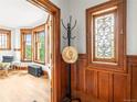 Charming entry with hardwood floors, stained-glass window, and unique architectural details at 2124 E 17Th Ave # 4, Denver, CO 80206