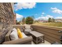Cozy outdoor patio with comfortable seating, perfect for relaxing or entertaining guests at 12744 Leyden St # F, Thornton, CO 80602