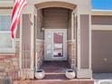 Close up of front entryway featuring a covered porch with stone and siding accents at 5238 Clearbrooke Ct, Castle Rock, CO 80104