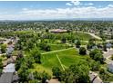 Expansive aerial view showcasing the community park and green spaces, great for recreation at 10009 Dodge Dr, Northglenn, CO 80260