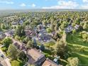Aerial view of the neighborhood showcasing mature trees, manicured lawns, and well-maintained homes at 10114 Meade Ct, Westminster, CO 80031