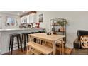 Bright kitchen with stainless steel appliances and a breakfast bar, ideal for modern living at 4820 W 13 Ave, Denver, CO 80204