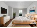 Serene main bedroom with modern decor, a large window, and ample natural light at 960 Milo Cir # B, Lafayette, CO 80026