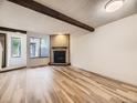 Living room with hardwood floors and stone fireplace at 2949 Shady Holw, Boulder, CO 80304