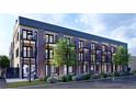 Modern three-story apartment building with balconies and beautifully landscaped grounds at 1652 N Lafayette St # 2, Denver, CO 80218
