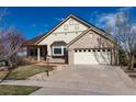 Beautiful single-Gathering home showcasing a well-maintained lawn and an attached two-car garage at 8198 S Sicily Ct, Aurora, CO 80016