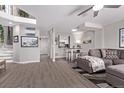Spacious living area with hardwood floors and comfortable seating at 12183 W Chenango Dr, Morrison, CO 80465
