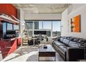 Open living area featuring city views and modern furnishings at 891 14Th St # 2816, Denver, CO 80202