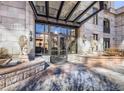 Grand building entrance featuring elegant stonework and lion statues, providing a luxurious welcome at 1827 N Grant St # 604, Denver, CO 80203