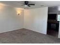 Cozy living room with new carpet and paint, and lots of space at 16753 E Ithaca Pl, Aurora, CO 80013