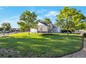 Spacious backyard with green lawn, perfect for outdoor activities and recreation at 1801 Aspen St, Fort Lupton, CO 80621