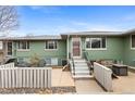 Well-maintained condo exterior with a private patio and charming curb appeal at 816 Forest St, Denver, CO 80220