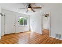 Hardwood flooring and natural light in a living room featuring a ceiling fan at 1804 Grove St, Denver, CO 80204