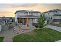 Attractive two-story home featuring a nicely landscaped front yard and appealing architectural details at 4145 Manorbrier Cir, Castle Rock, CO 80104
