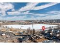 Aerial view of the property near a lake at 4700 S Decatur St, Englewood, CO 80110