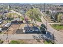 Aerial view of the property showcasing its location, surrounding neighborhood, and lot size with adjacent streets at 16130 Mt Vernon Rd, Golden, CO 80401