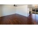 Spacious living room with hardwood floors and ample natural light at 3268 S Patton Ct, Denver, CO 80236