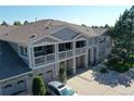 Attractive two-story home boasting charming architecture, private balconies, and attached garages at 4251 S Blackhawk Cir # 3E, Aurora, CO 80014