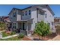 Charming two-story home with stone accents and a well-manicured front yard at 3338 Ireland Moss St, Castle Rock, CO 80109