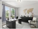Bright office space featuring modern desk, stylish decor, and large windows with neighborhood views at 3338 Ireland Moss St, Castle Rock, CO 80109