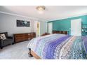Bright main bedroom with a large bed, ample storage, and calming paint colors at 72 Rudi W Ln, Golden, CO 80403