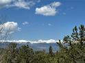 Breathtaking panoramic view of snow-capped mountains from the property at 72 Rudi W Ln, Golden, CO 80403