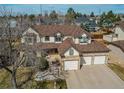 Sprawling two-story home with a three car garage in a lush neighborhood at 17085 E Dorado Cir, Centennial, CO 80015