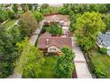 Expansive aerial view of a single Gathering home, large backyard, barn, and detached garage at 7785 W 5Th Ave, Lakewood, CO 80226