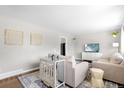 Cozy living room with neutral walls, elegant furniture, and stylish decor, creating a comfortable atmosphere at 2502 S Lima St, Aurora, CO 80014