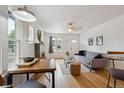 Inviting living room with hardwood floors, stylish furniture, and plenty of natural light at 1736 Grove St, Denver, CO 80204