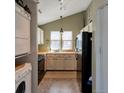 Efficient kitchen with appliances and storage, also includes a washer and dryer at 9640 W Chatfield Ave # A, Littleton, CO 80128