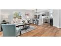 Open floor plan with a seamless transition from the living room to the kitchen at 2 S Knox Ct, Denver, CO 80219