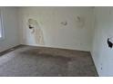 Empty living room offering ample space to design to your liking at 2597 S Dillon St, Aurora, CO 80014