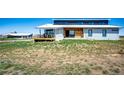 Well-kept modern home with an outdoor deck and xeriscaping at 43010 Ptarmigan Ranch St, Parker, CO 80138