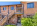 Inviting townhouse showcasing private entrance and easy access to parking at 2223 S Buckley Rd # 102, Aurora, CO 80013