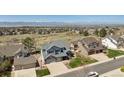 Expansive aerial view of the home's location, showcasing its proximity to a thriving neighborhood and natural landscape at 9895 Wyecliff Dr, Highlands Ranch, CO 80126