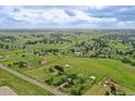 Picturesque aerial view of a serene neighborhood, showcasing lush green landscapes at 12798 Tomahawk Rd, Parker, CO 80138