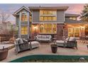 Inviting backyard patio with comfortable seating, perfect for outdoor entertaining at 6132 S Boston Cir, Englewood, CO 80111