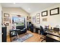 Bright office space with hardwood floors and a window with backyard views at 420 Graham Cir, Erie, CO 80516