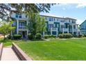 Row of attractive townhomes with balconies, lawns, and landscaping, offering curb appeal at 658 Casper Dr, Lafayette, CO 80026