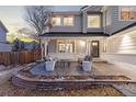 Relaxing backyard patio featuring outdoor seating, creating a perfect space for entertaining at 18233 E Dorado Ave, Centennial, CO 80015