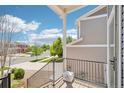 A view of the neighborhood street from the balcony showcasing the beautiful scenery at 5571 Killarney St, Denver, CO 80249