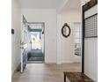 Inviting entryway with bench and coat rack at 1030 W Hopkins Dr, Elizabeth, CO 80107